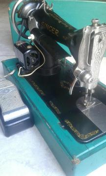 Ecxelente Máquina de Coser Singer