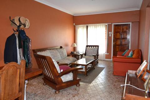 Vendo Sillon Living tapizado color naranjo