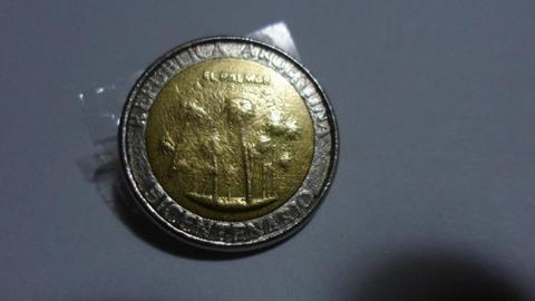 moneda de un peso del bicentenario con fallas grandes