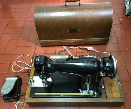 Máquina de coser eléctrica