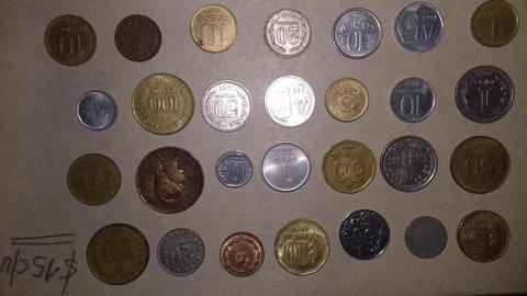 Lote de monedas antiguas c/una tiene su valor. Consultar